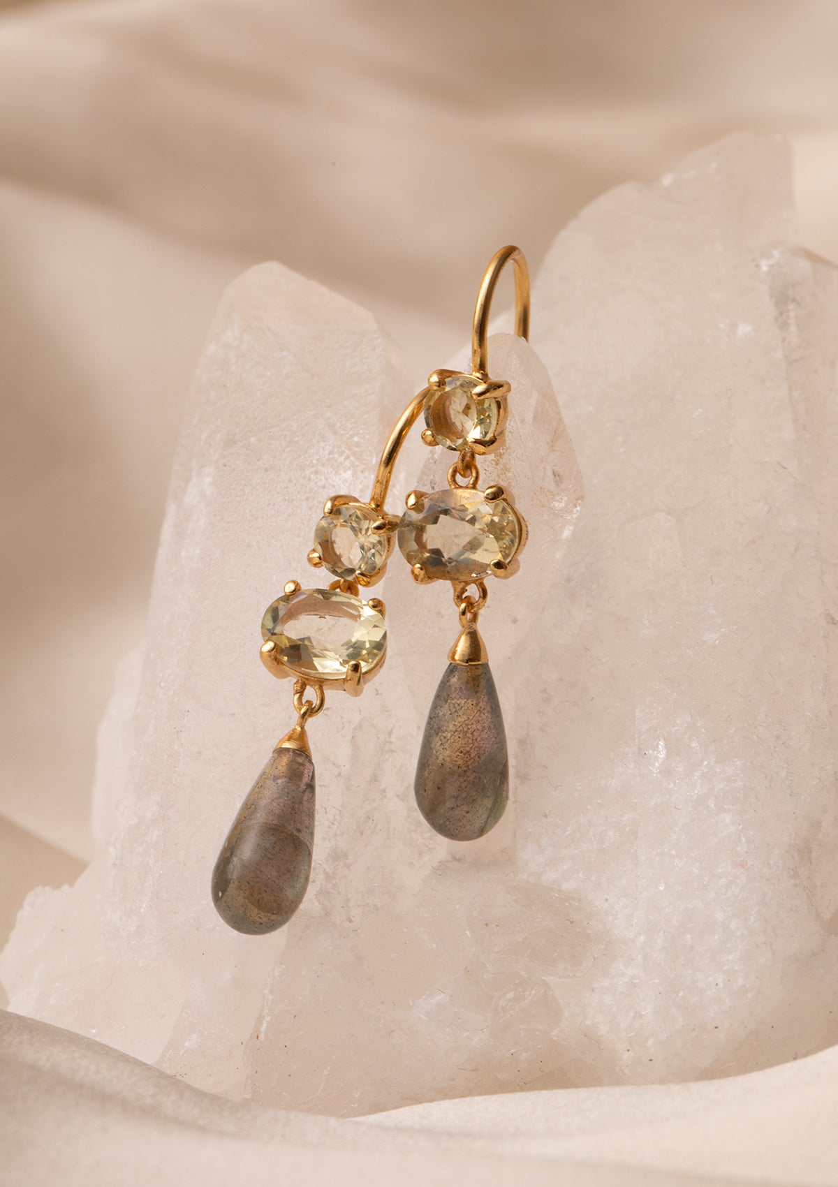 Long gold plated earrings from Carré set with the yellow-green lemon quartz gemstone and a labradorite drop