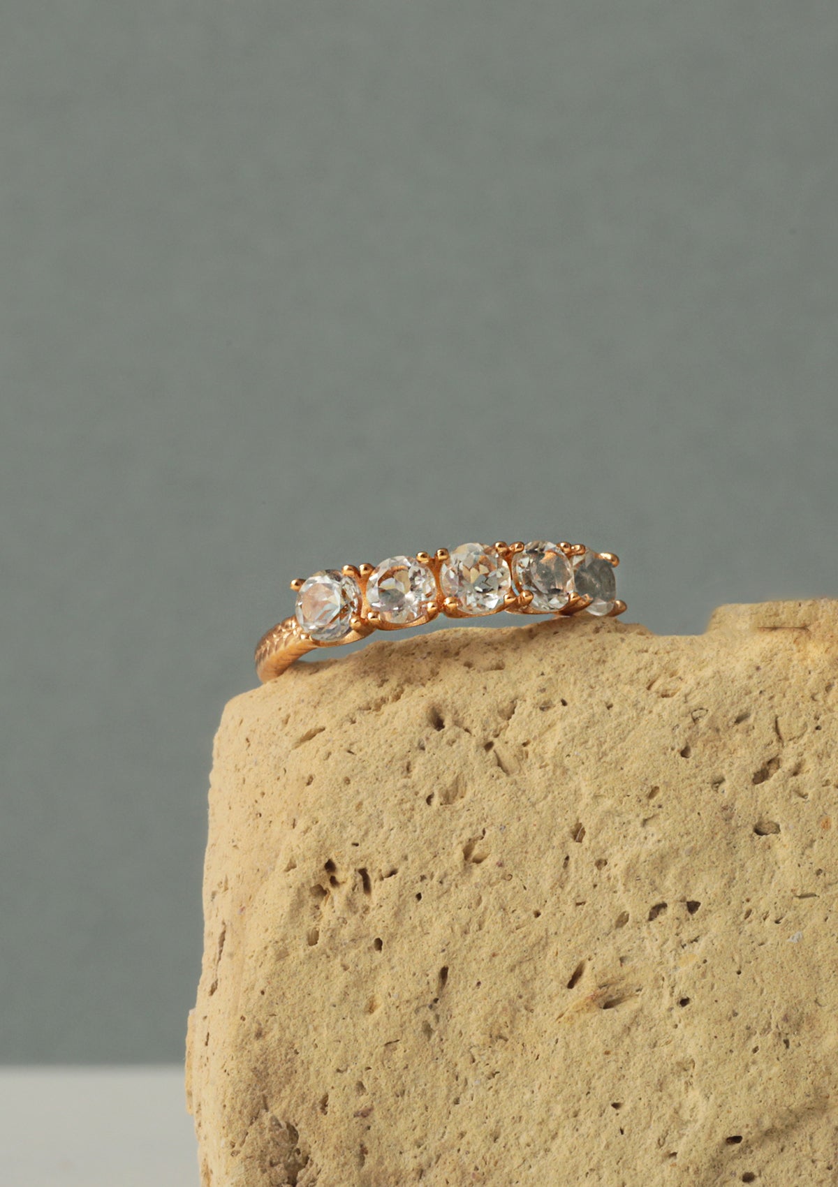 A gold plated ring from Carré set with the sage green gemstone Prasiolite