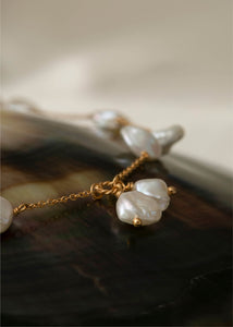 Up close of freshwater keshi pearls from carré jewellery's Ines chains