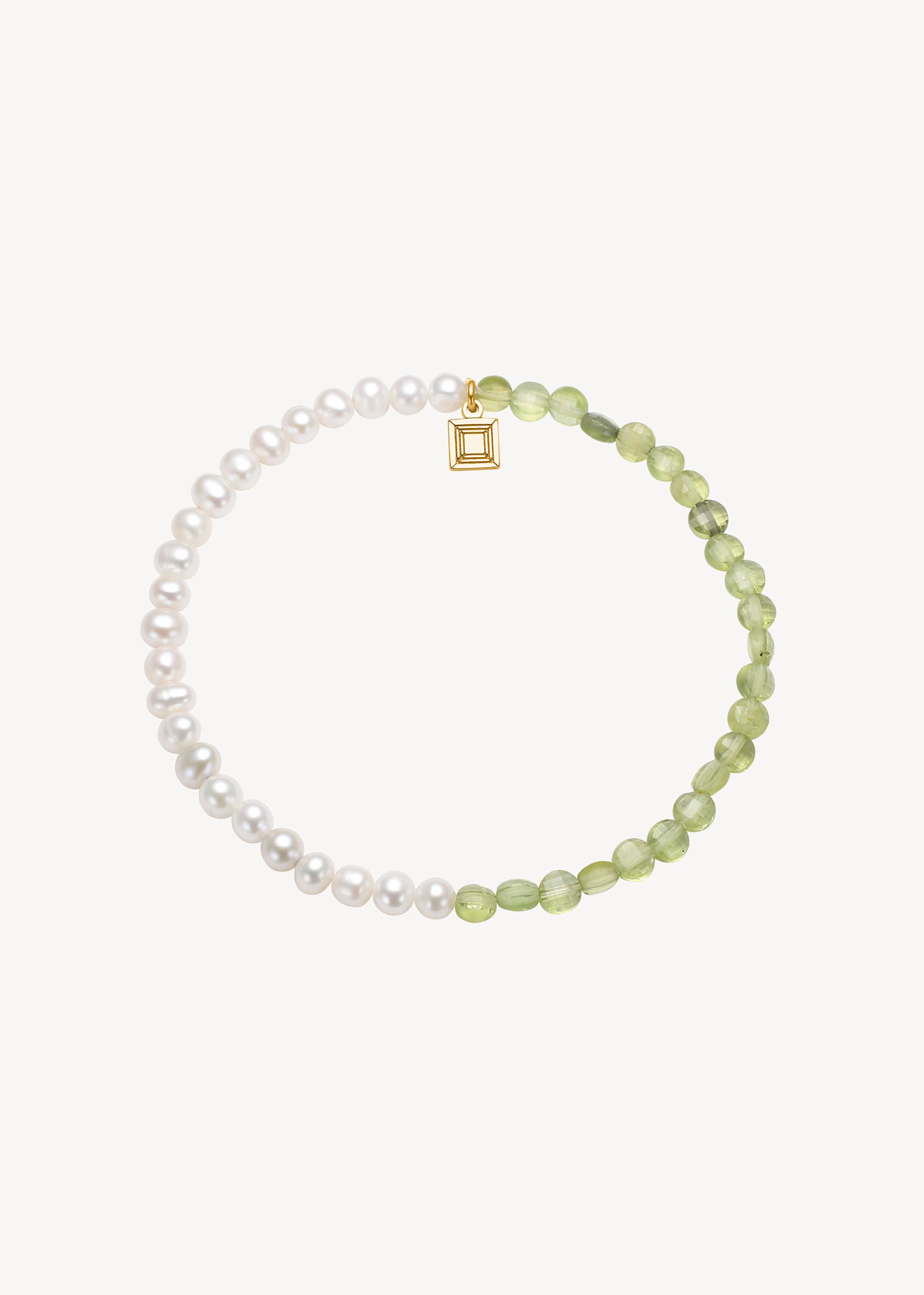 Handmade gemstone bracelet with recycled gemstones on elastic from carré jewellery set with June's birthstone, white freshwater pearls, and  August's birthstone, green peridot gemstones