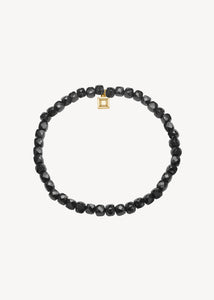 Slip on gemstone friendship bracelet from Carré Jewellery set with Black Spinel gemstones in a cube cut