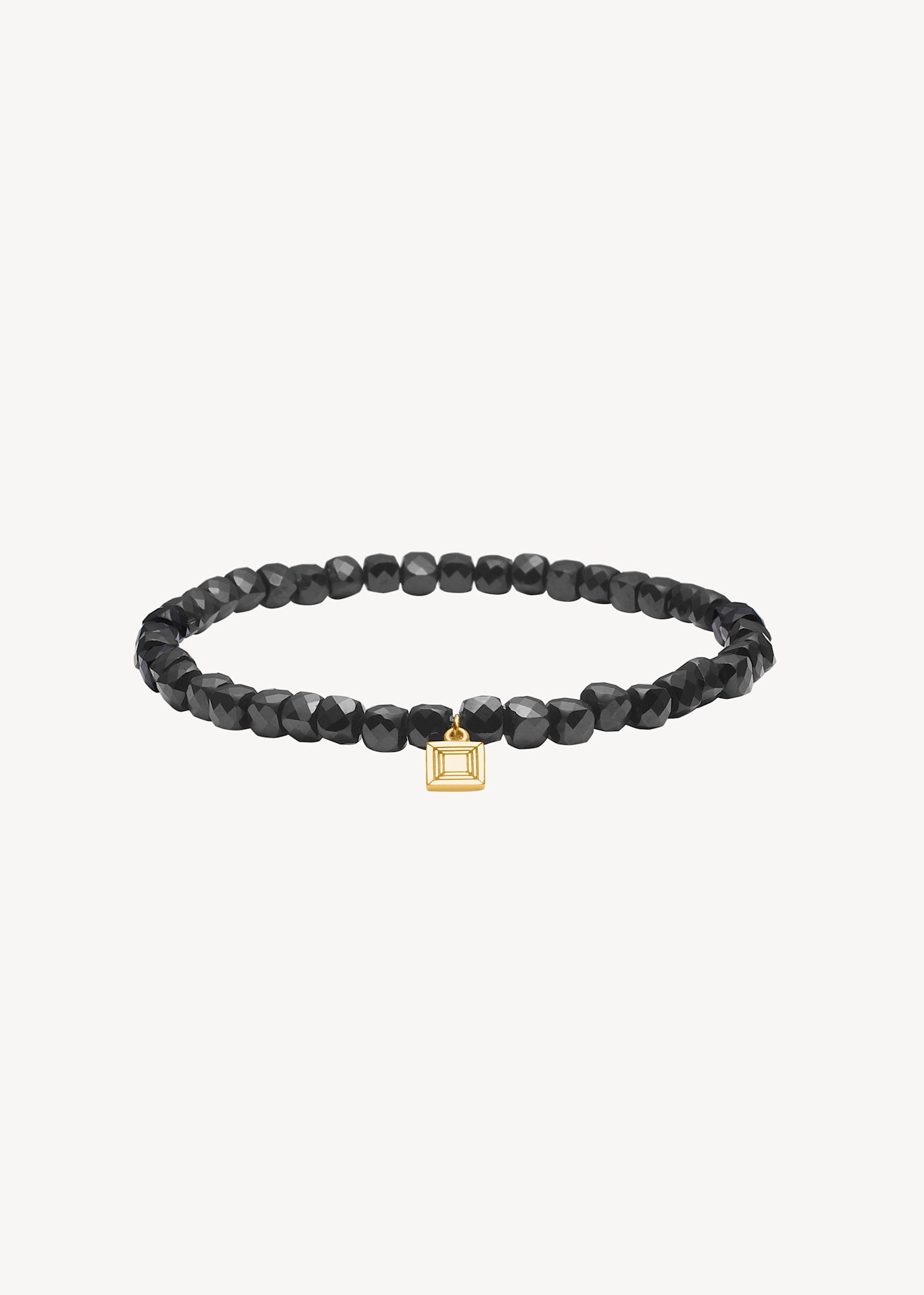 Slip on gemstone friendship bracelet from Carré Jewellery set with Black Spinel gemstones in a cube cut