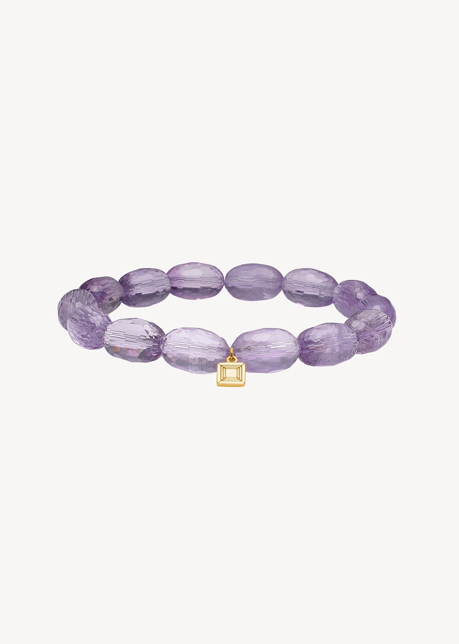 Slip on gemstone friendship bracelet from Carré Jewellery set with February's birthstone, purple Amethyst gemstones in a facet-cut