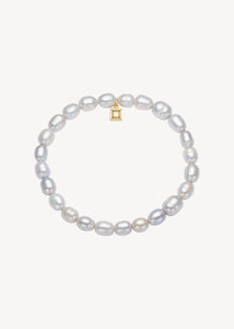 Slip on gemstone friendship bracelet from Carré Jewellery set with June's birthstone, grey freshwater pearls