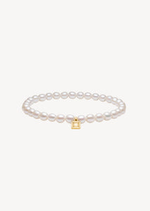 Slip on gemstone friendship bracelet from Carré Jewellery set with June's birthstone, white freshwater pearls