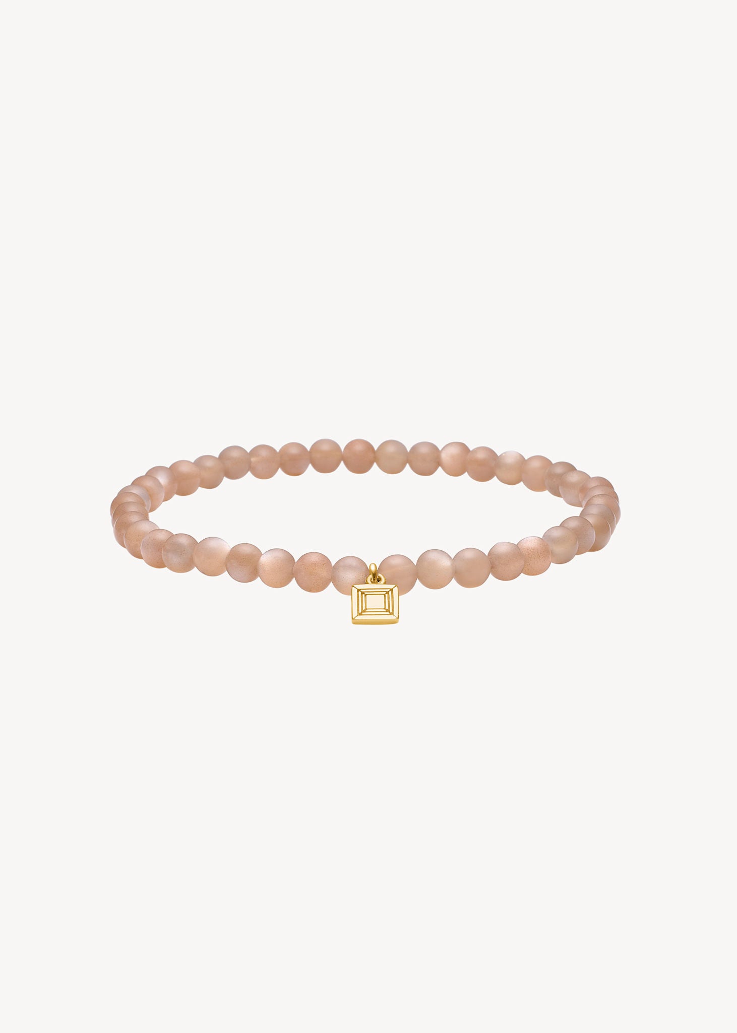 Slip on gemstone friendship bracelet from Carré Jewellery set with June's birthstone Sand Moonstone in cabochon cut