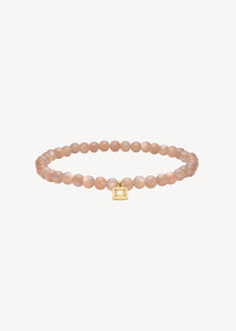 Slip on gemstone friendship bracelet from Carré Jewellery set with June's birthstone Sand Moonstone in cabochon cut