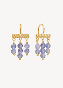 18k gold plated silver long dangling earrings in boho antique style set with purple tanzanite gemstones from Carré Jewellery