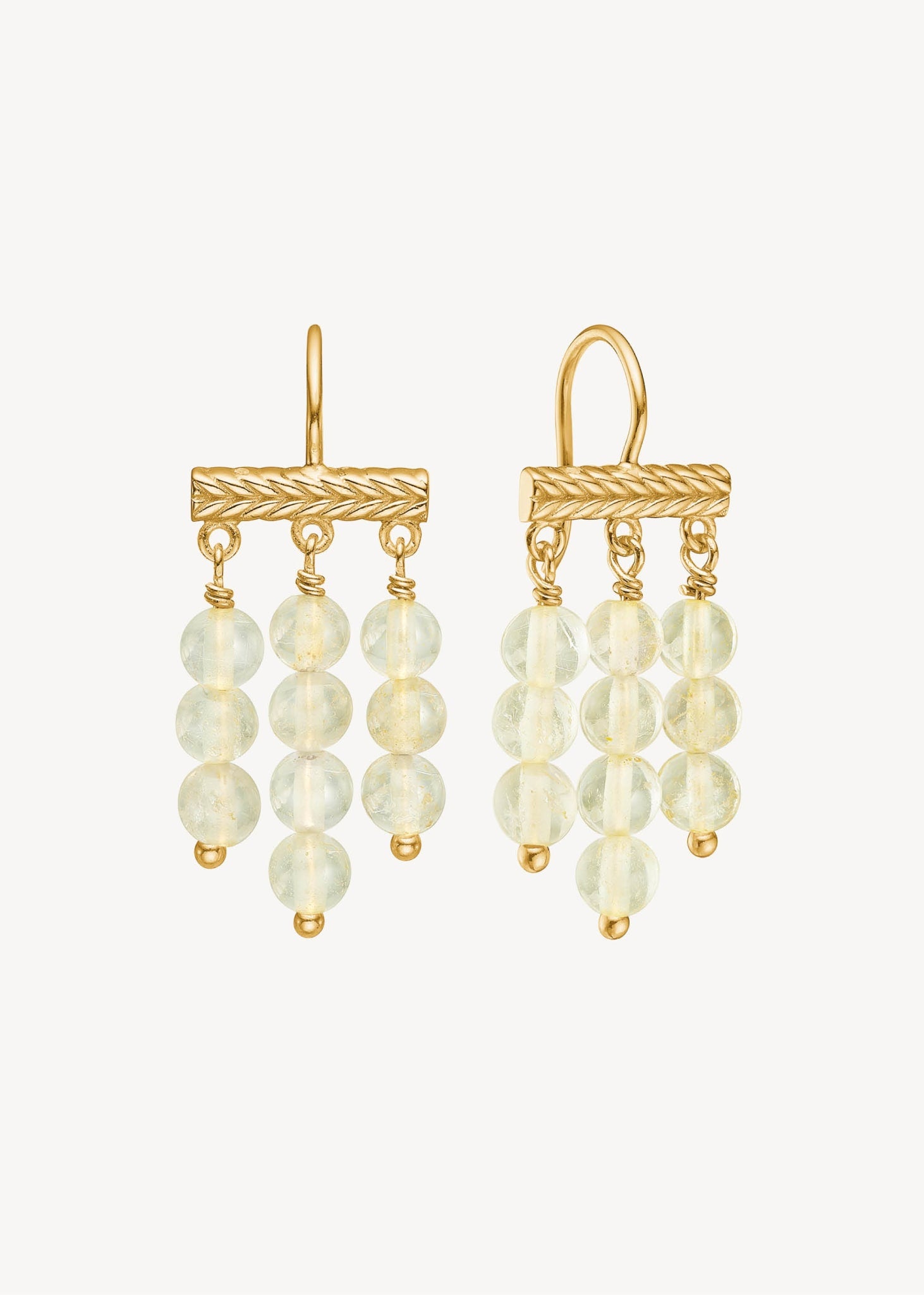 18k gold plated silver long elegant earrings from Carré Jewellery set with rutilated golden quartz gemstones