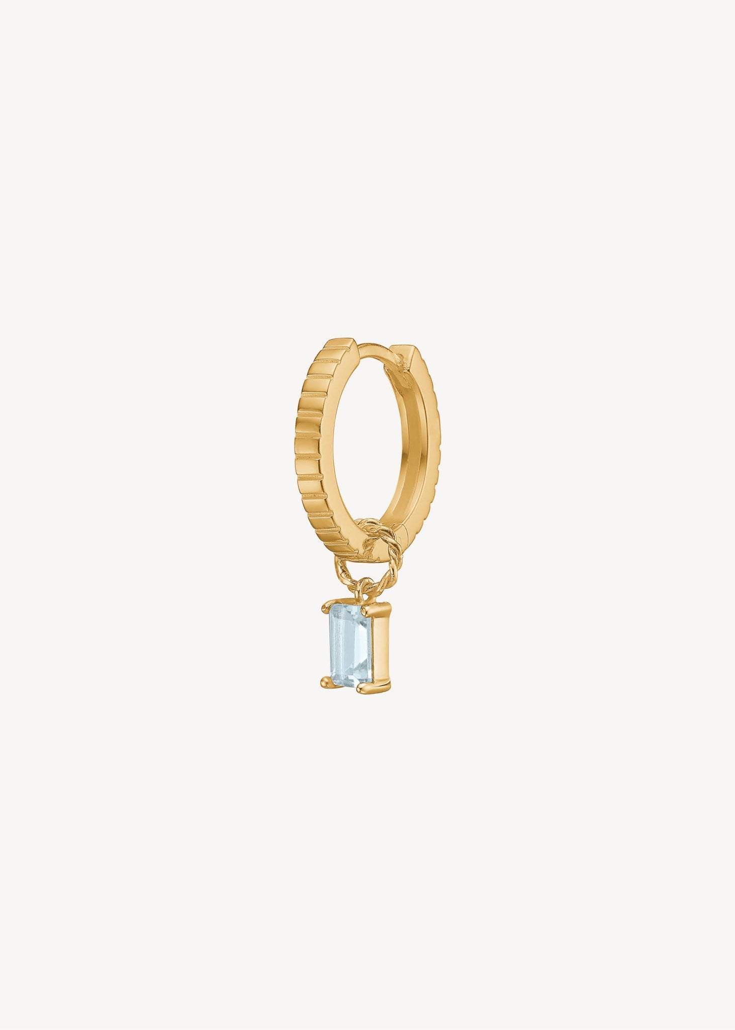 Confidence charm with Blue Topaz - gold plated