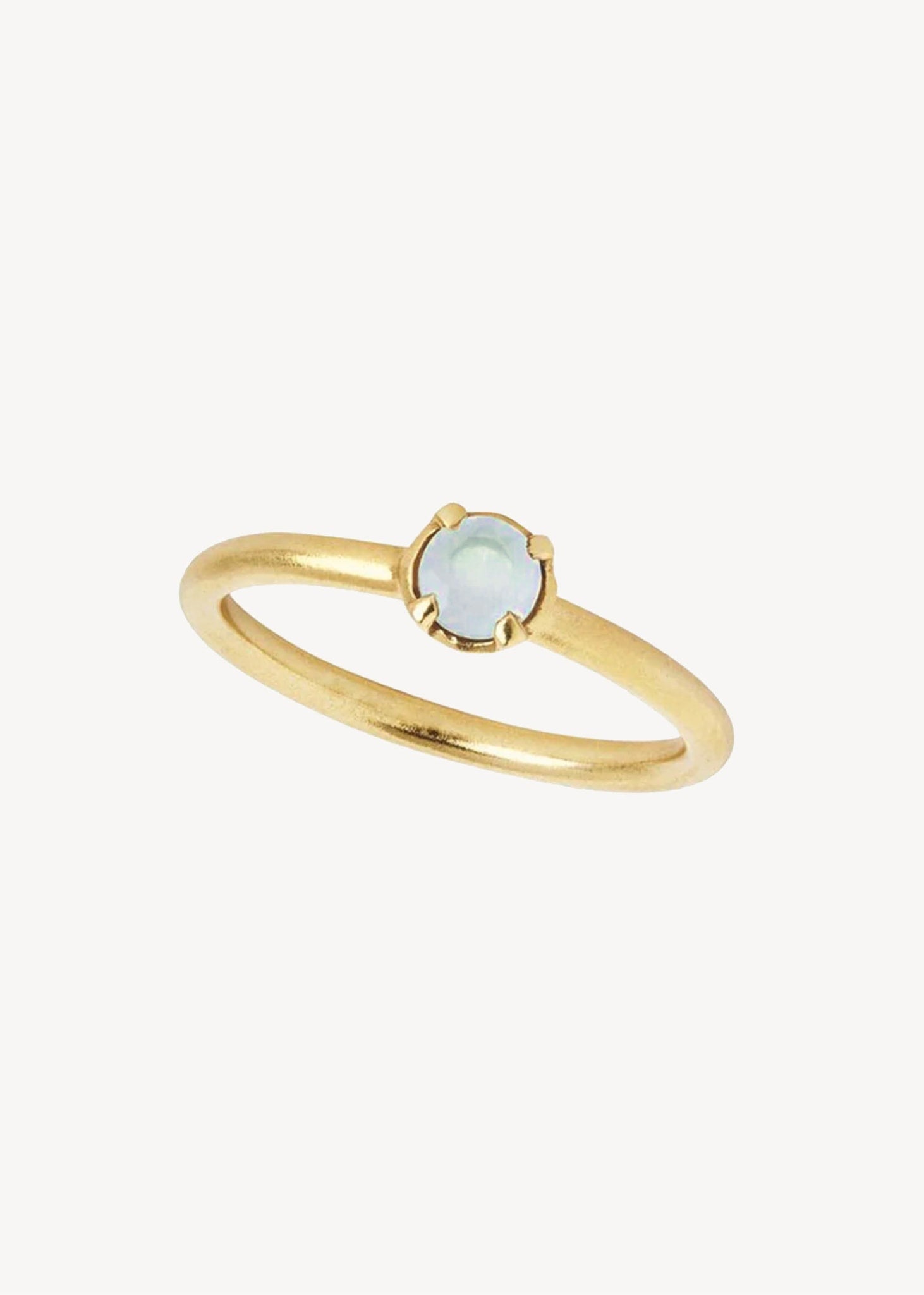 Elegant and simple Aquamarine ring in gold which is March's birthstone, perfect for the birthstone jewellery gift for her and for something blue jewellery on a wedding day