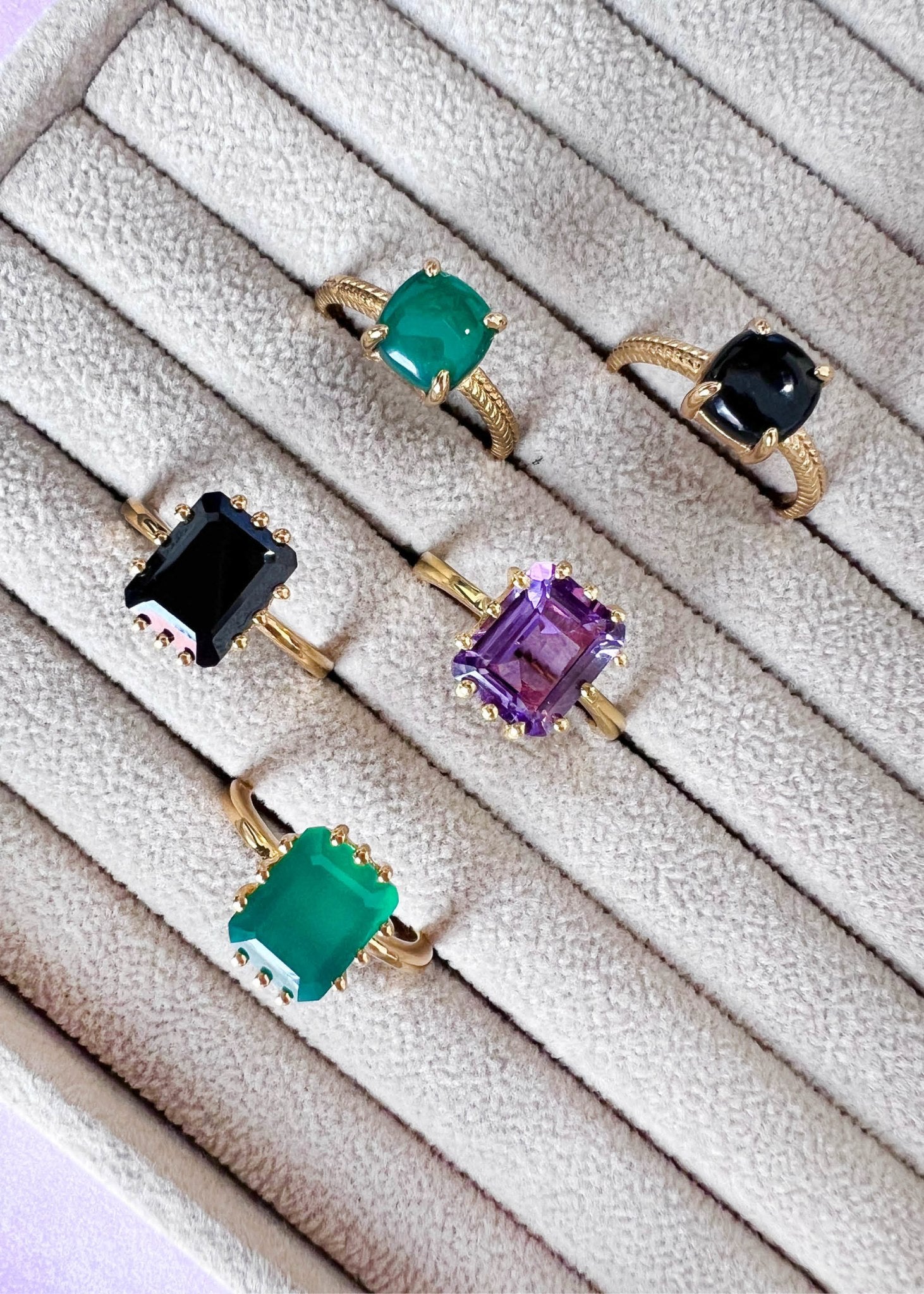 Gold plated sterling silver rings from carré jewellery's midnight collection with green agate, black agate and amethyst gemstones