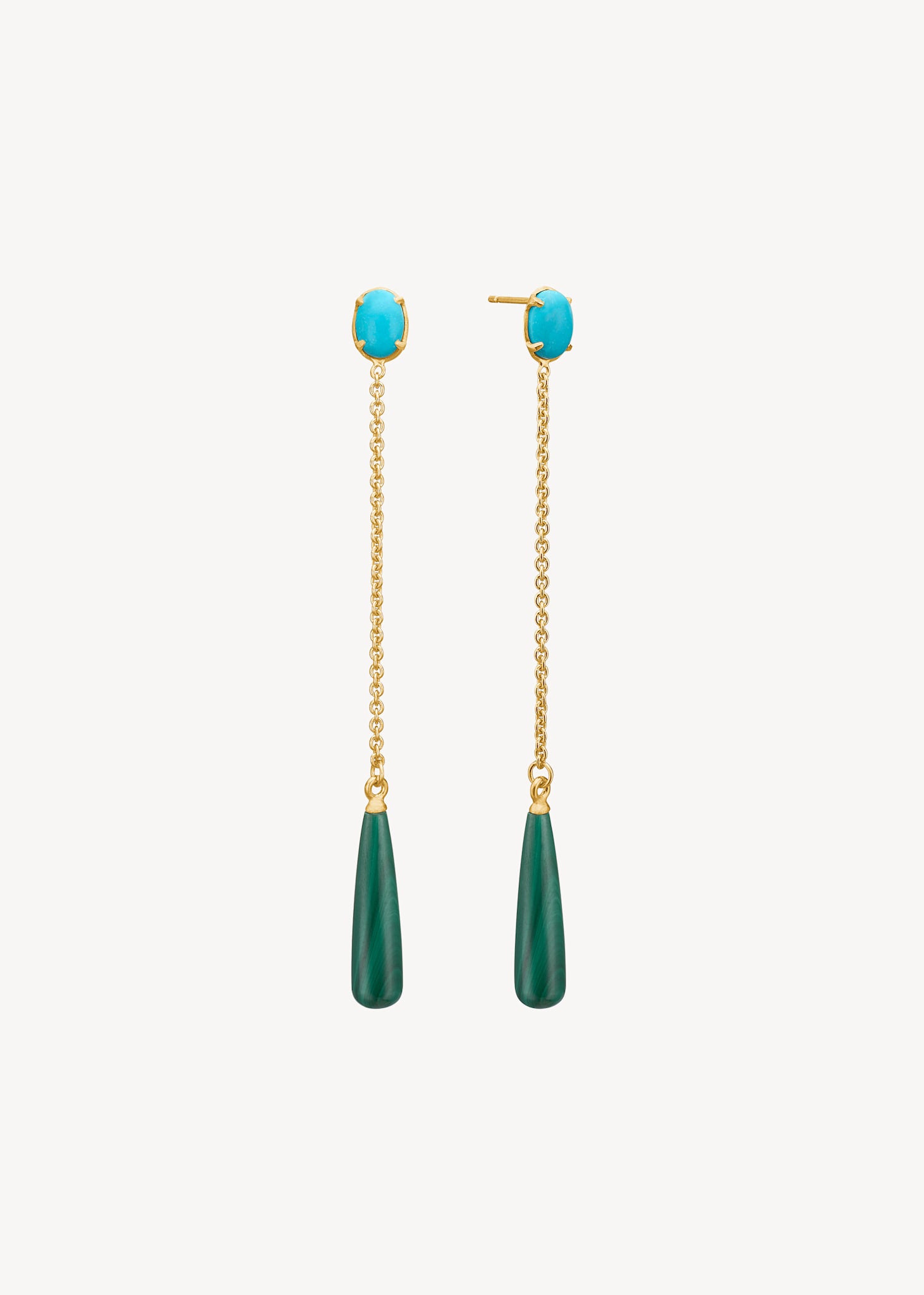 Long dangling gold earrings set with turquoise gemstones and a long gold plated sterling silver chain with two drops of green malachite gemstones in cabochon cuts