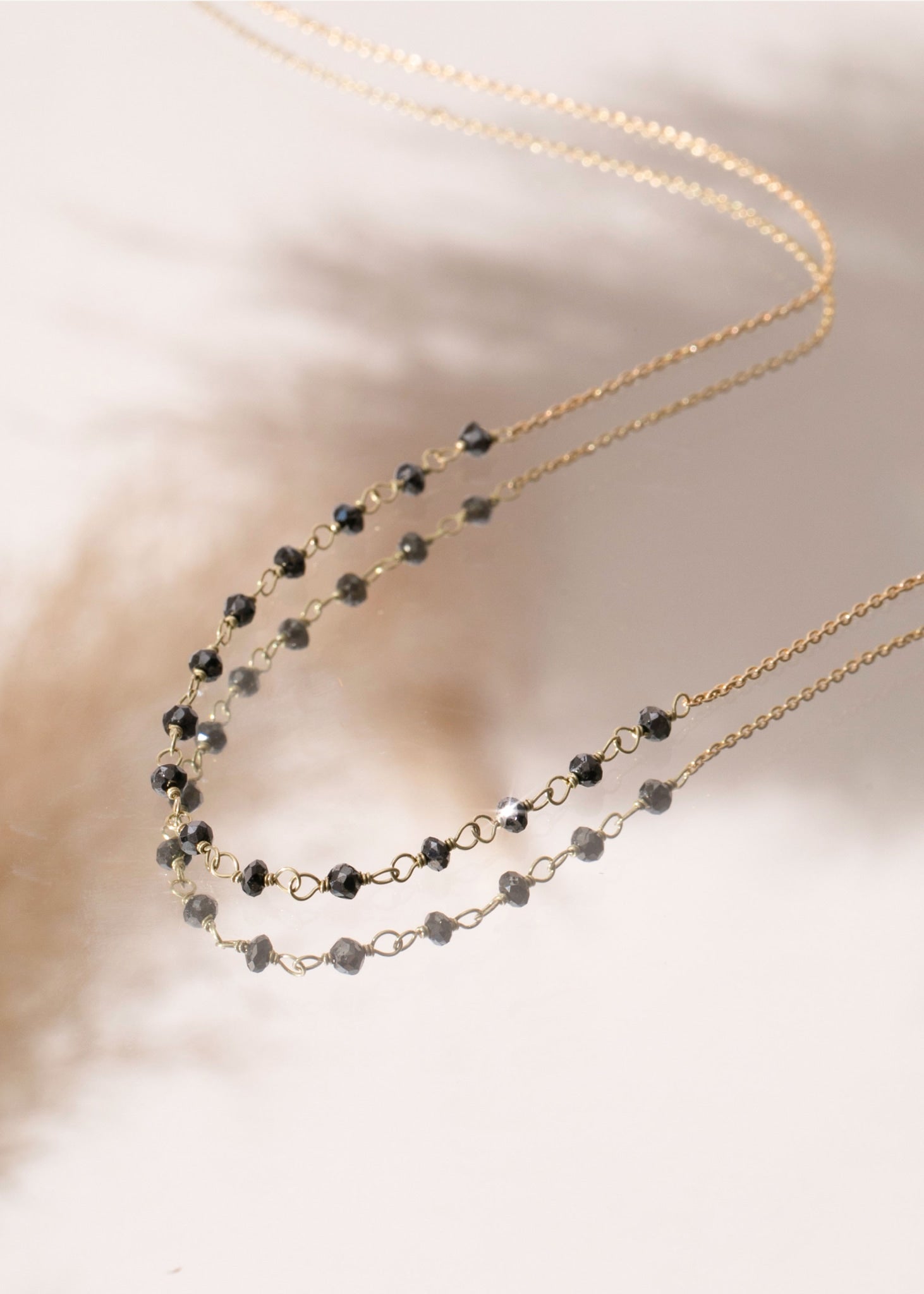 18-Karat Cocktail chain with black Diamond