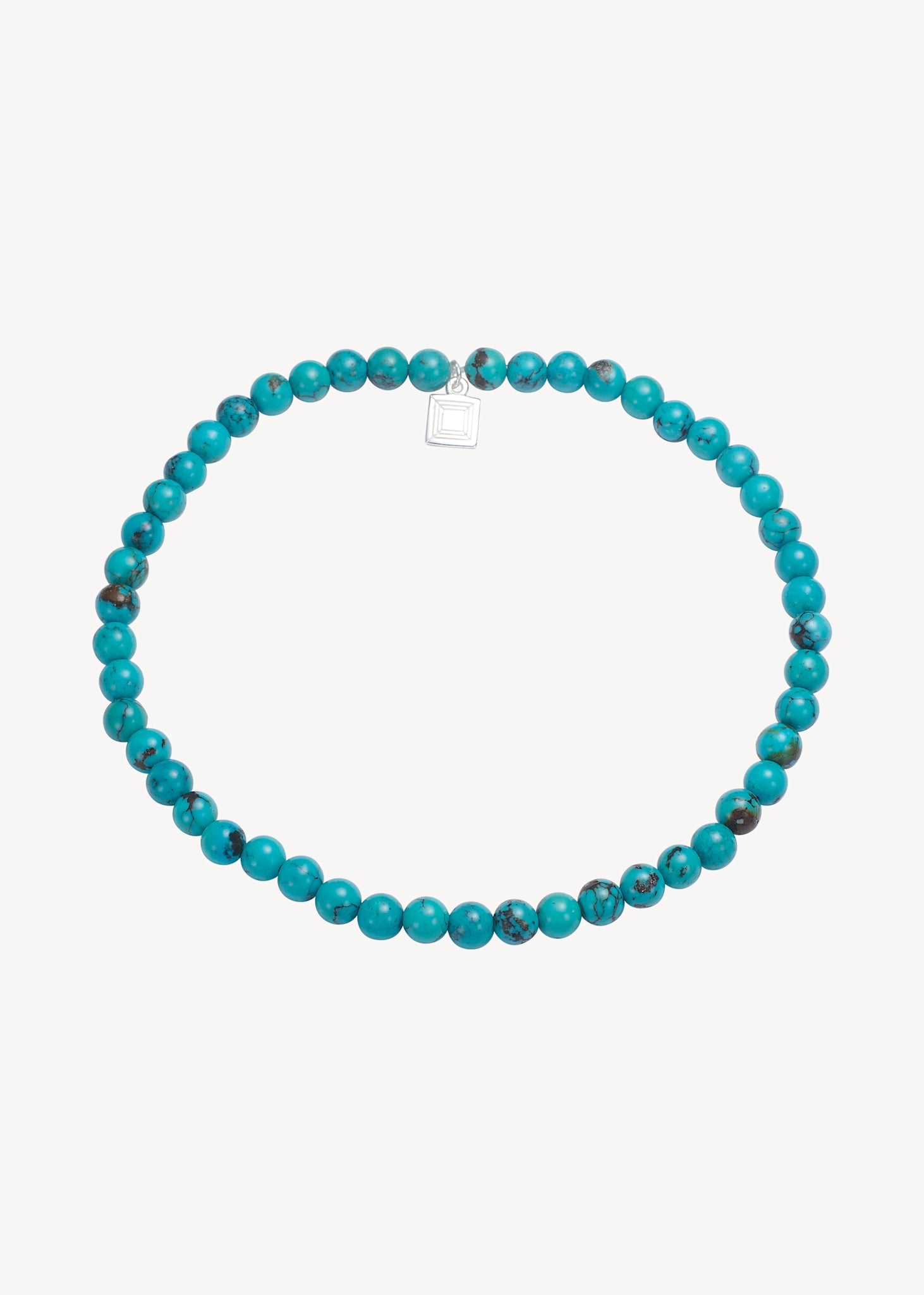 Ocean armbåndet til mænd er lavet i sterling sølv og er elastisk og kommer nemt af og på og er sat med blå turkis ædelsten