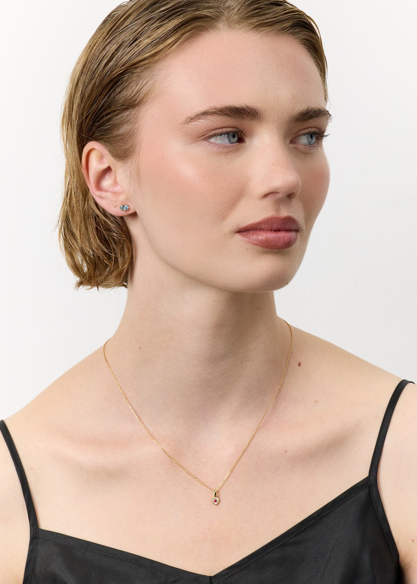 10-karat Amor pendant with Ruby