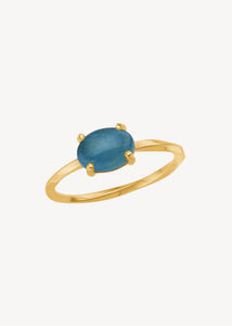 Simple and elegant 10-karat real gold ring with a twisted ring shank set with March's birthstone, Aquamarine in a cabochon-cut for anniversaries and wedding day jewellery