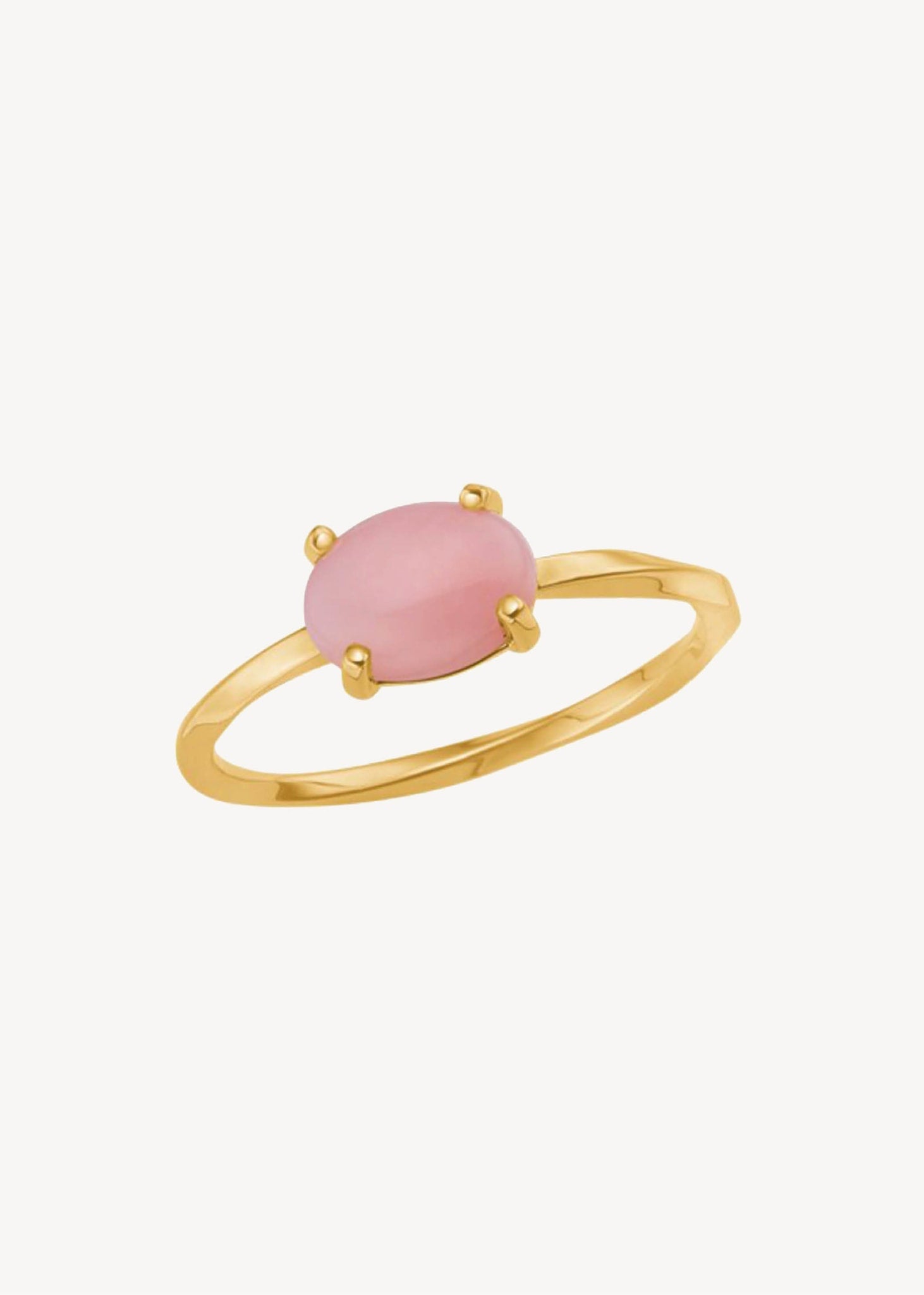 Simple and elegant 10-karat real gold ring with a twisted ring shank set with October's birthstone, Pink Opal in a cabochon-cut for anniversaries and wedding day jewellery