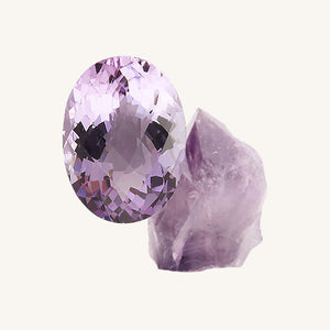 a facet-cut amethyst and a raw amethyst gemstone on a beige background