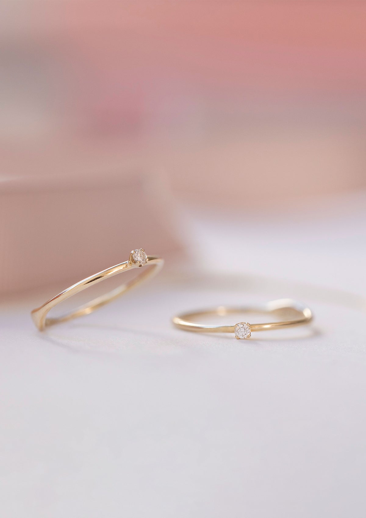 two solid gold diamond engagement rings from carré