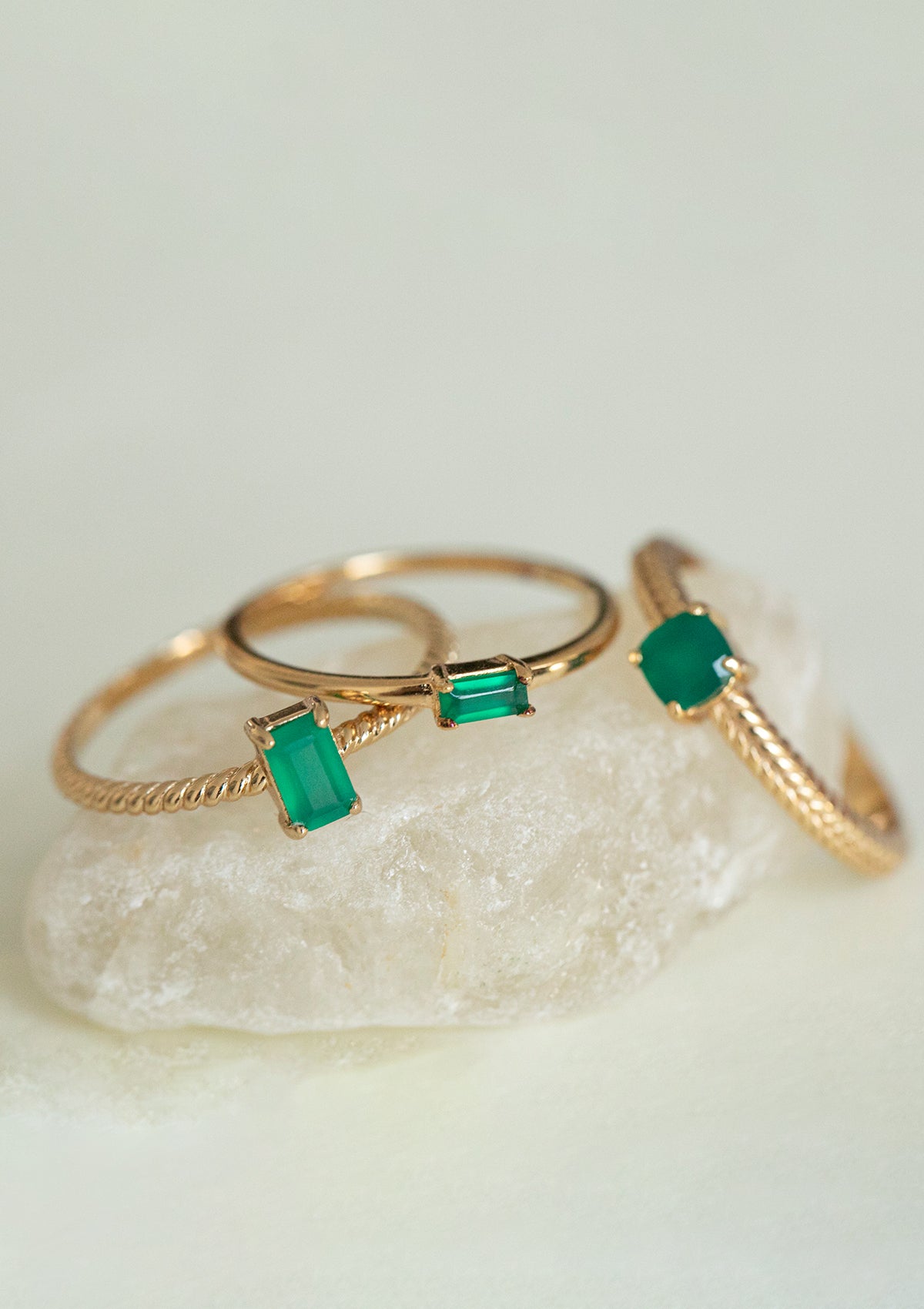 gold plated rings with green stones from carré. The green stones are called green agate