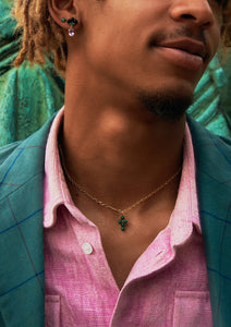 young man wearing gold plated jewellery for men set with malachite stones from Carré