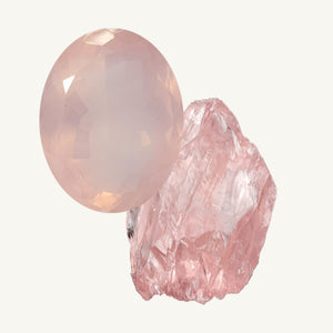 A facet-cut rose quartz and a raw rose quartz gemstone on a beige background